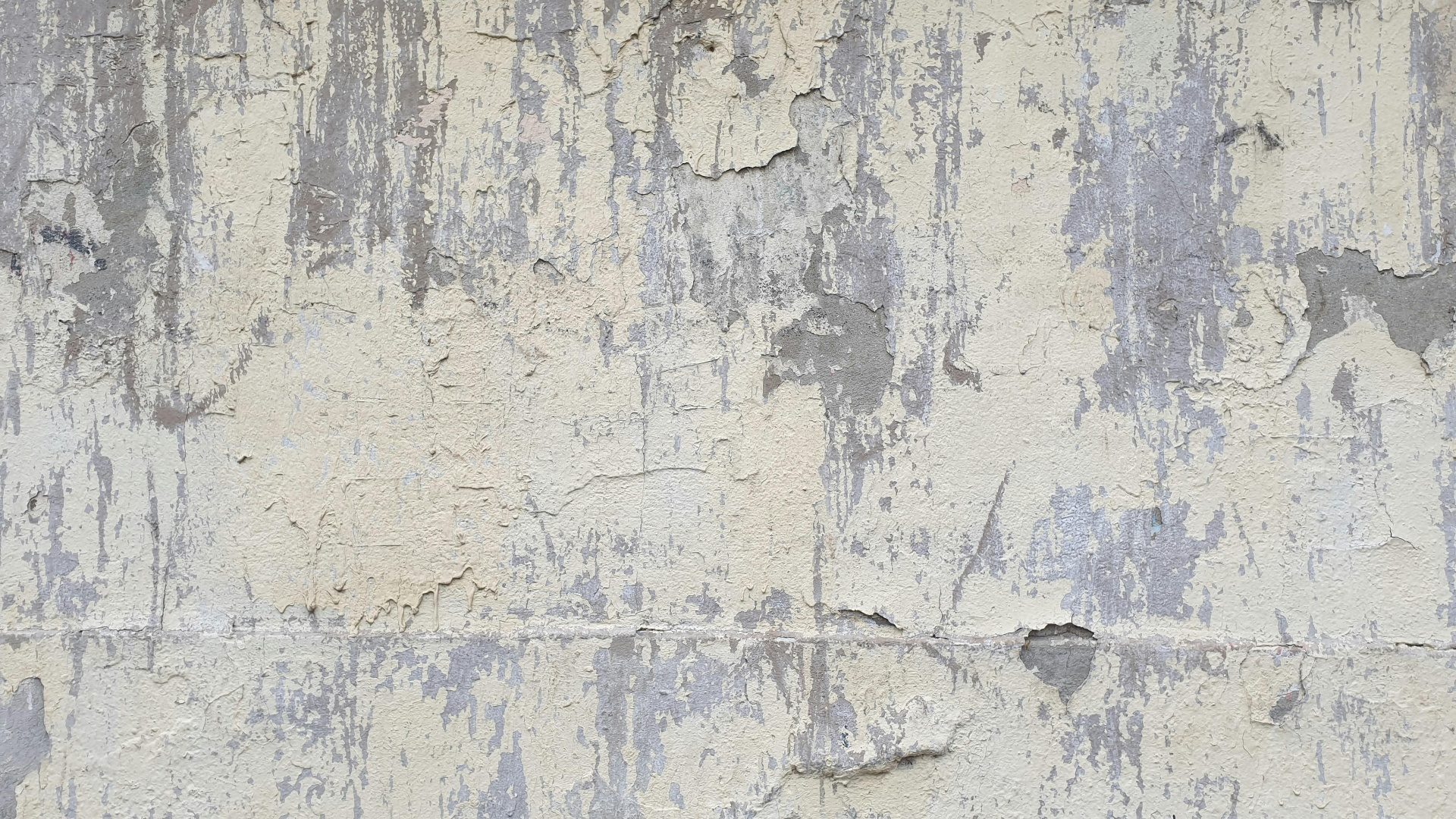 Weathered wall texture representing the layered decisions of renting and selling at the same time